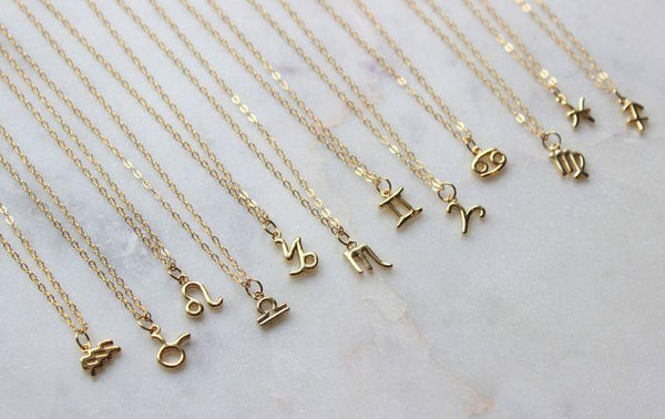 What's your sign? This zodiac necklace is a golden answer. Sweet charm necklace makes a lovely birthday or wedding party gift. 14K gold-filled, 16.5" length chain Includes gift box for easy gifting. Aries, Taurus, Gemini, Cancer, Leo, Virgo, Libra, Scorpio, Sagittarius, Capricorn, Aquarius, Pisces.